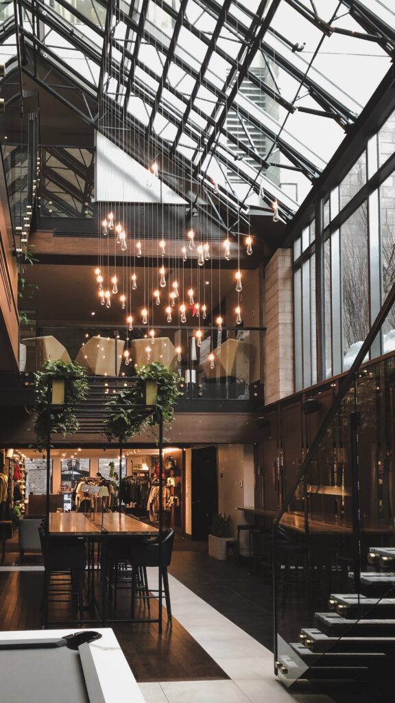 interior shot of a hotel lobby with a glass celling and beautiful lighting